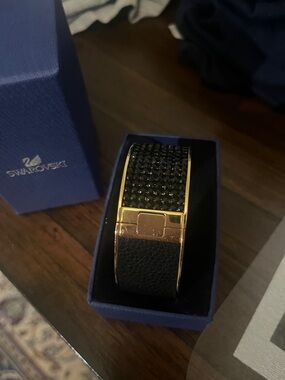 Swarovski Women’s Black Crystal Leather Cuff Bracelet with Gold-Tone Hardware